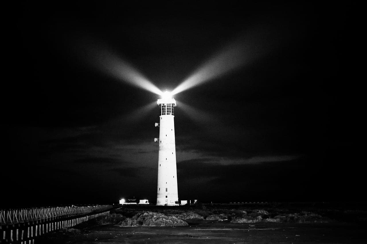 Atlantic lighthouse on the rocky coast near Cádiz, on the southern tip of Andalusia, Spain