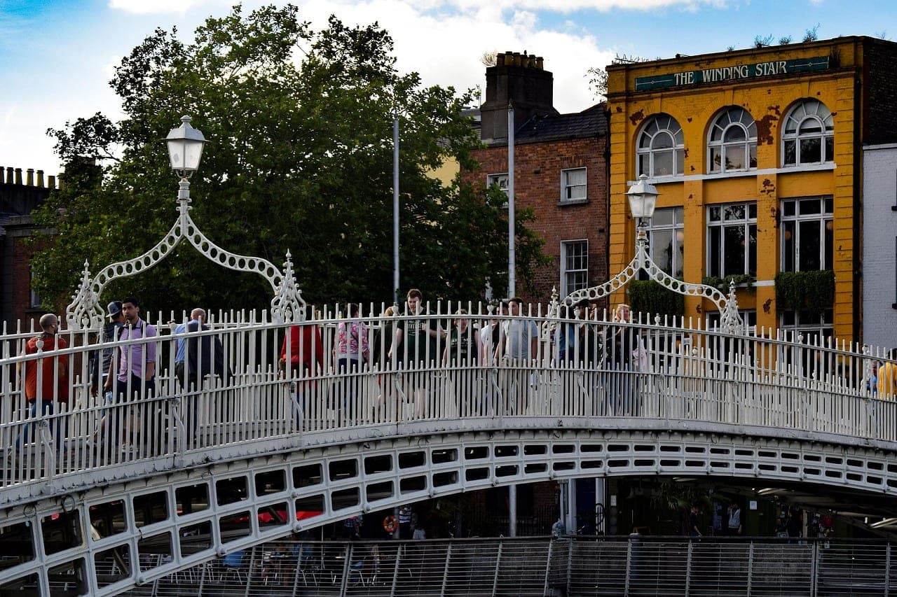 Georgian doors and the Ha'penny Bridge along the River Liffey in central Dublin