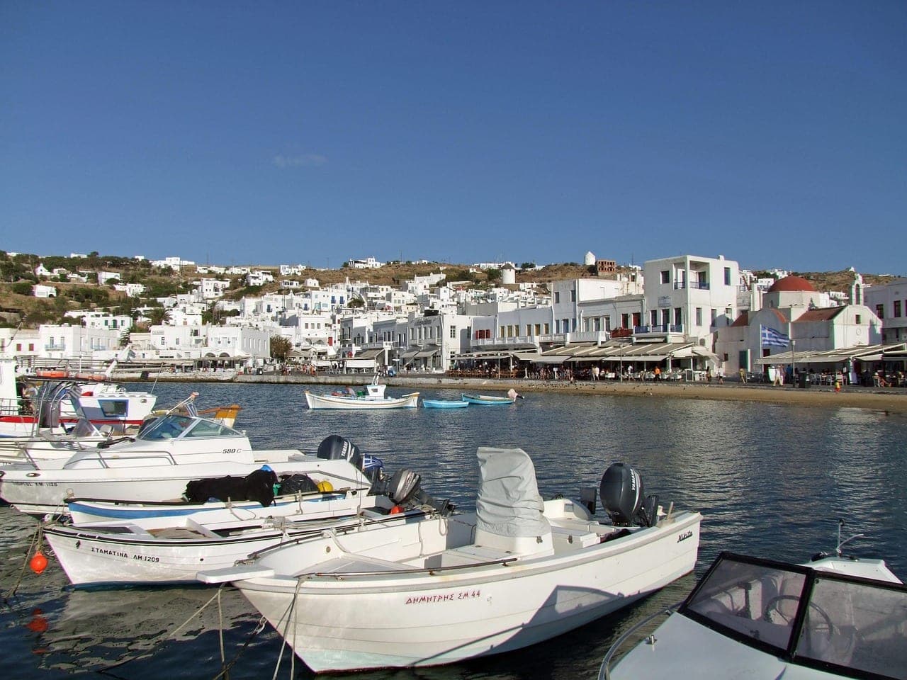 Whitewashed Cycladic houses of Mykonos Chora descending to the harbor, Greece